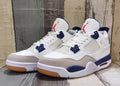 Air Jordan 4 Retro Off-White & Navy Blue Sneakers