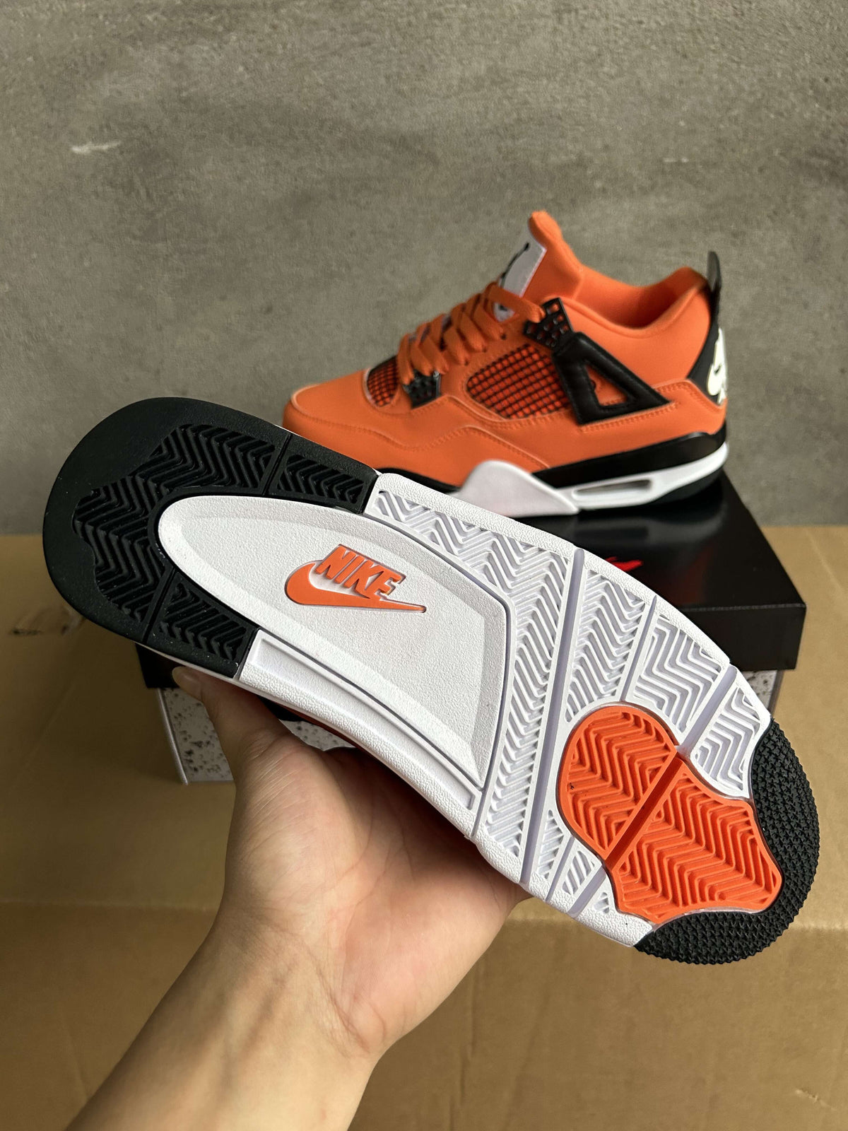 Air Jordan 4 Retro Starfish Orange Sneakers