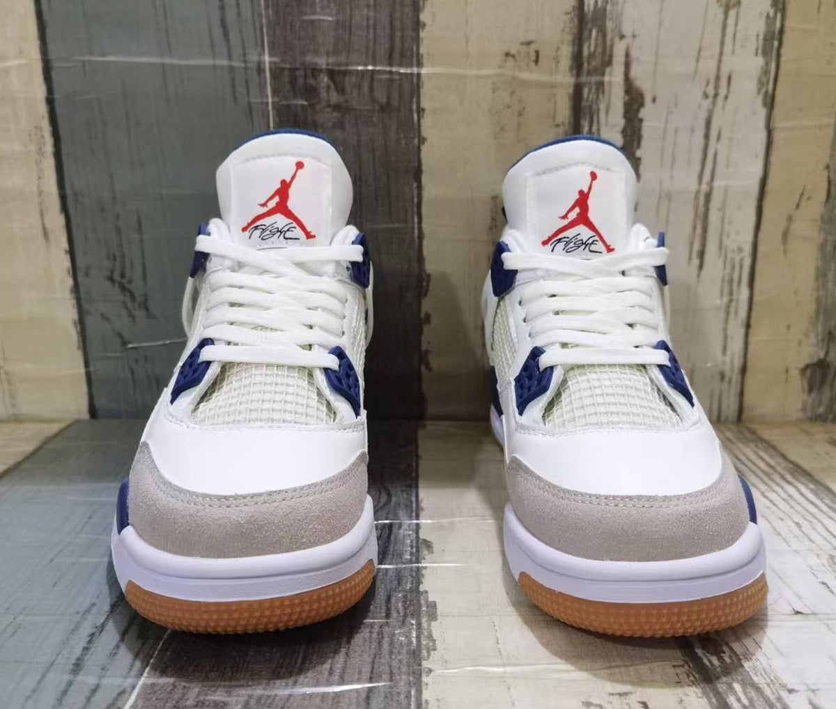 Air Jordan 4 Retro Off-White & Navy Blue Sneakers
